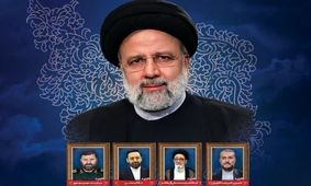 شال و عمامه آیت‌الله رئیسی در کنار تصویر شهدای خدمت در مصلی تهران/ عکس