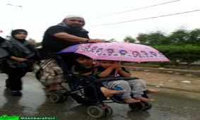 پیاده روی اربعین زیر بارش باران