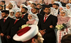(تصاویر) ازدواج دسته جمعی فلسطینی‌ها