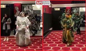 با برگزارکننده نمایش مد و لباس مختلط برخورد می‌شود