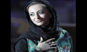 دیدار بازیگر زن با همسر آتشنشان جان باخته در حادثه پلاسکو/ عکس